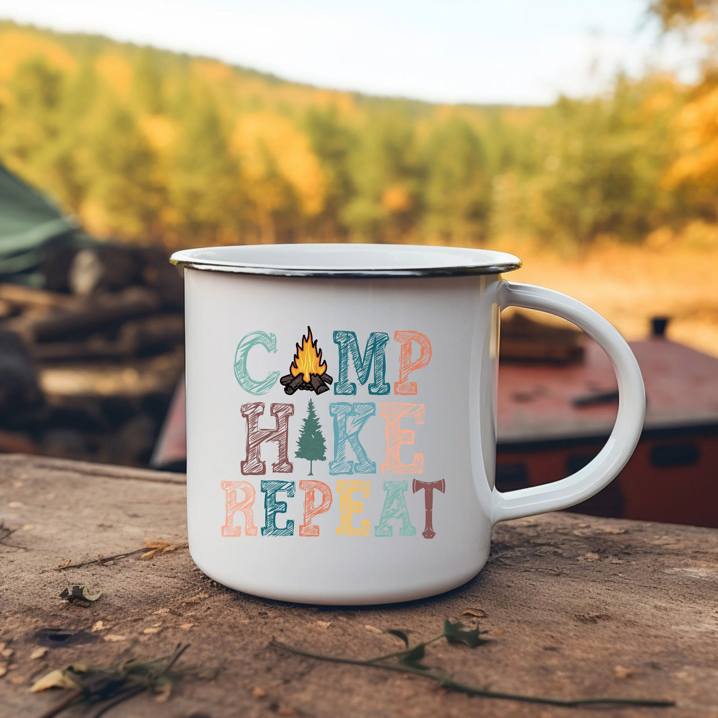 a camp mug sitting on top of a wooden table