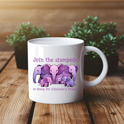 a coffee mug with a picture of three elephants on it