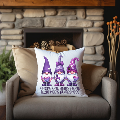 a pillow with a picture of three gnomes on it