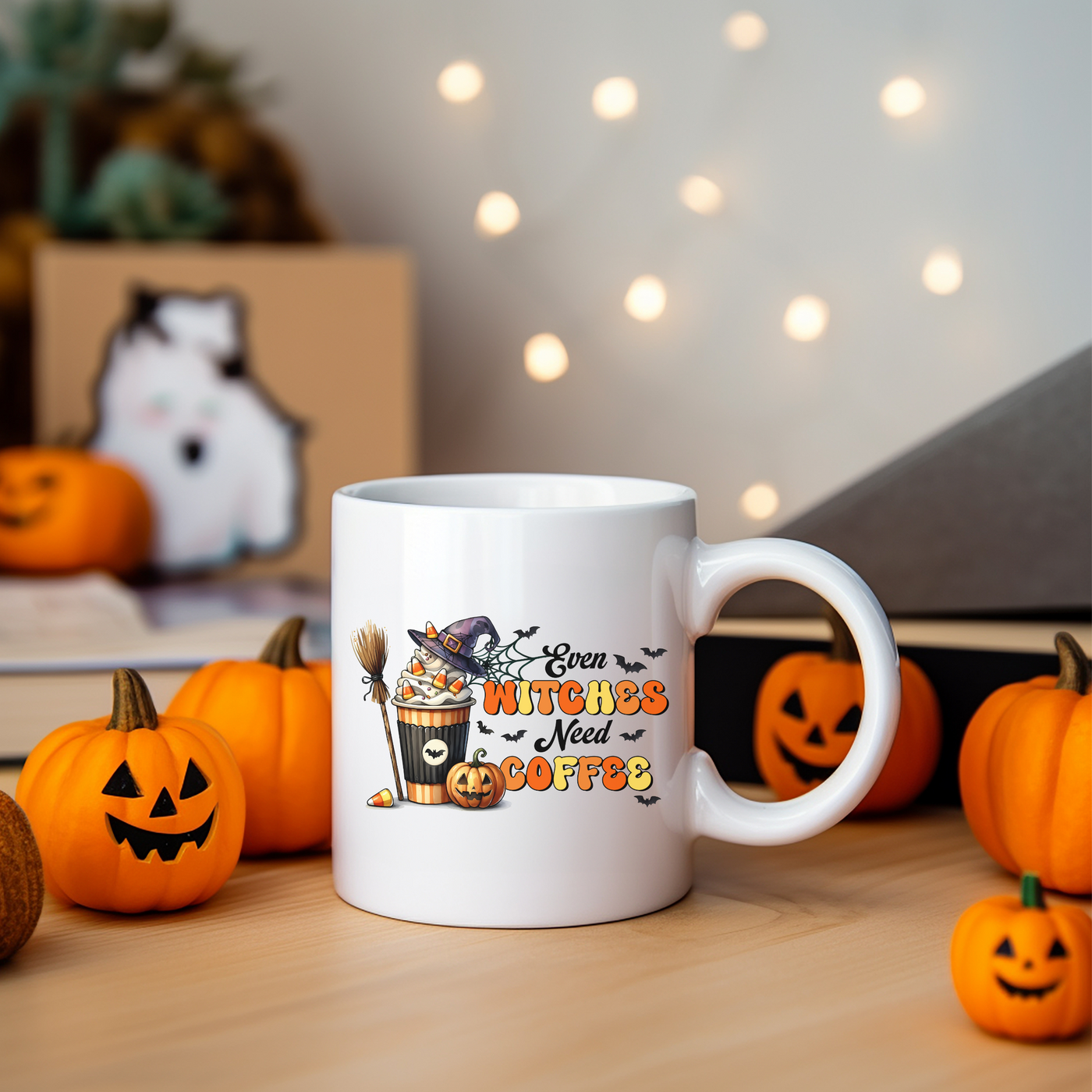 a white coffee mug sitting on top of a wooden table