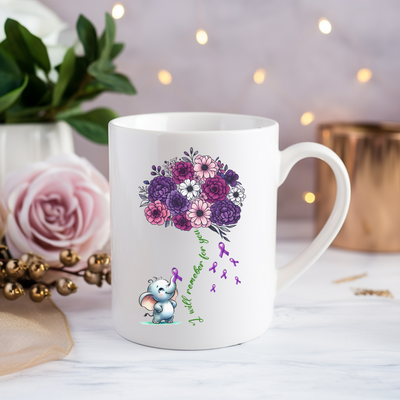 a white coffee mug with a bouquet of flowers on it