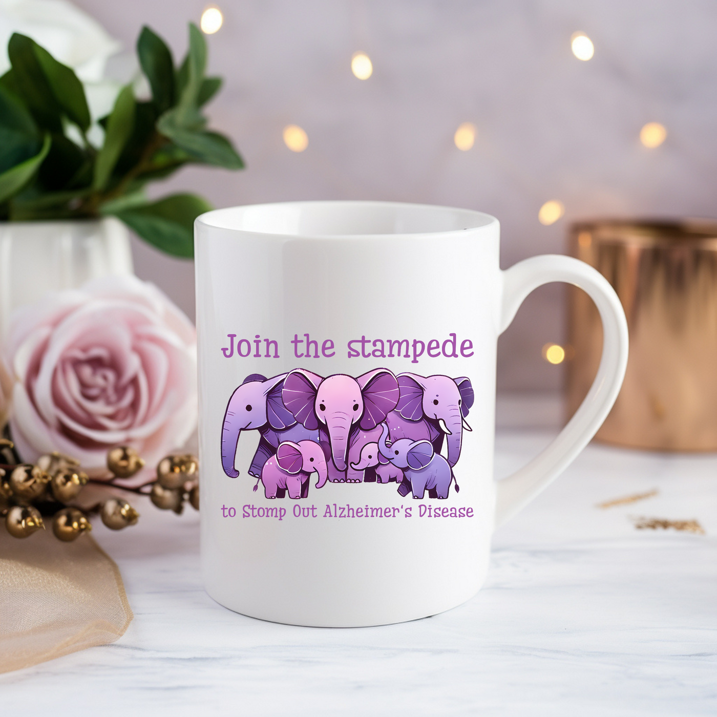 a coffee mug with a picture of three elephants on it