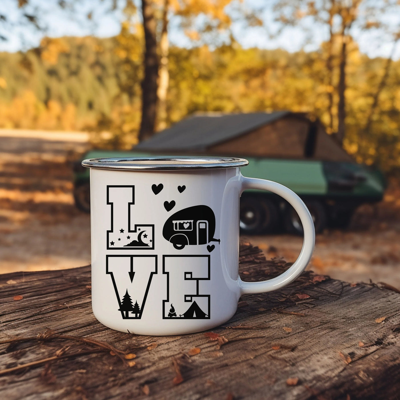 a camper mug sitting on top of a tree stump