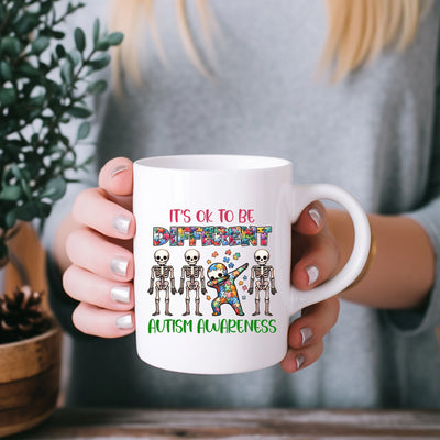 a woman holding a coffee mug with a skeleton on it