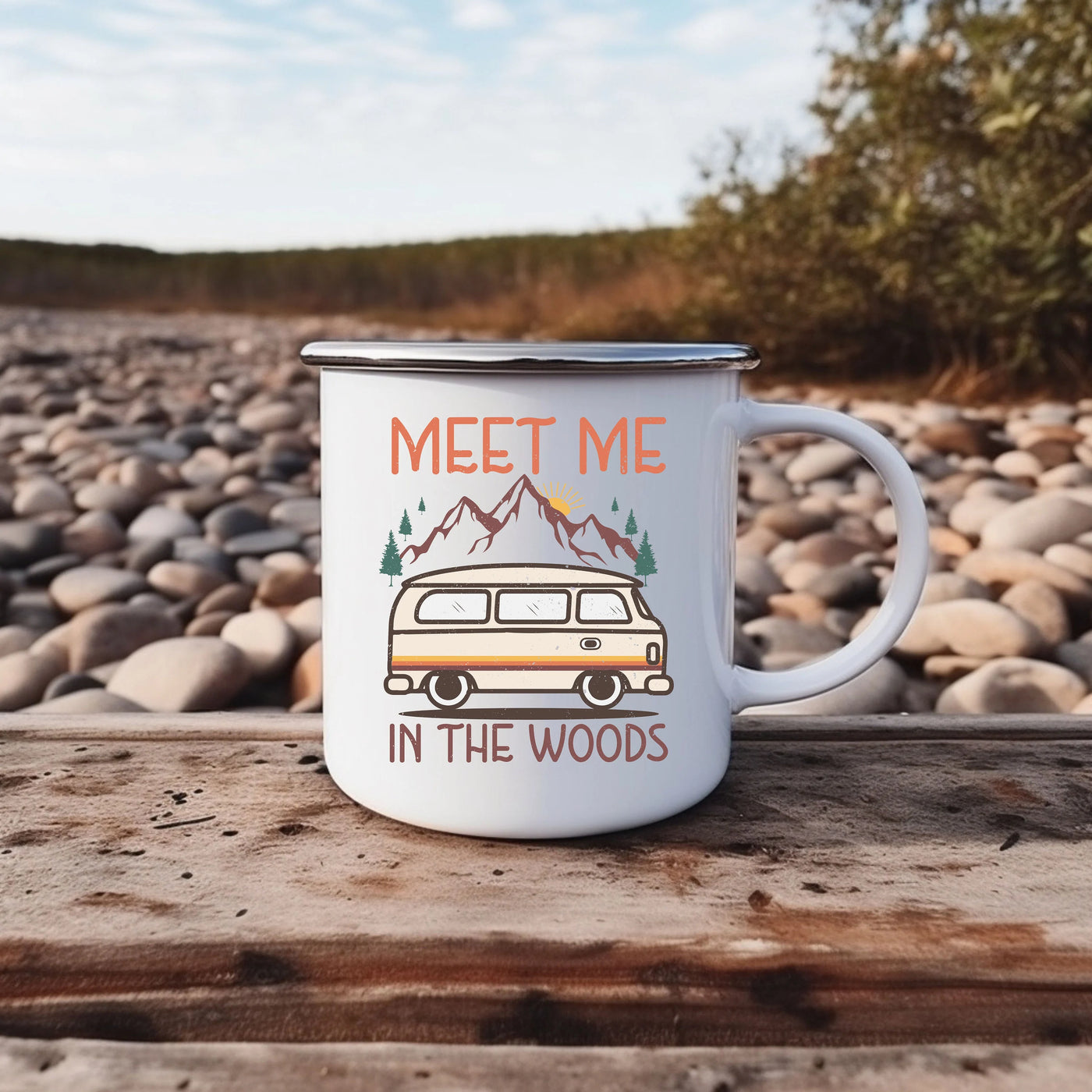 a camper mug that says meet me in the woods