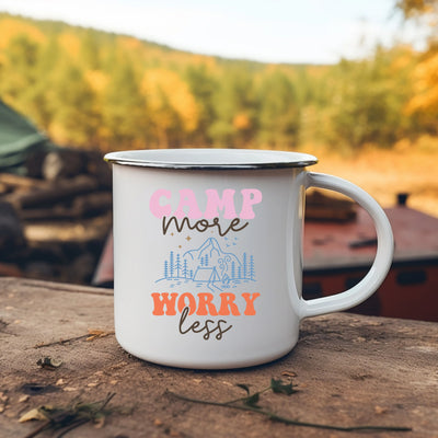 a camp mug sitting on top of a wooden table