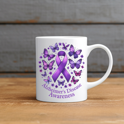 a white coffee mug with a purple ribbon and butterflies on it