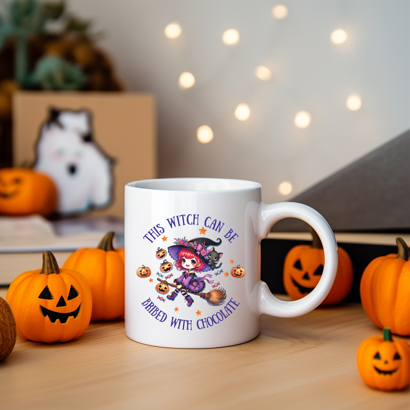 a white coffee mug with a witch on it