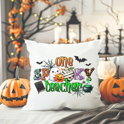 a pillow that says one scary teacher on it