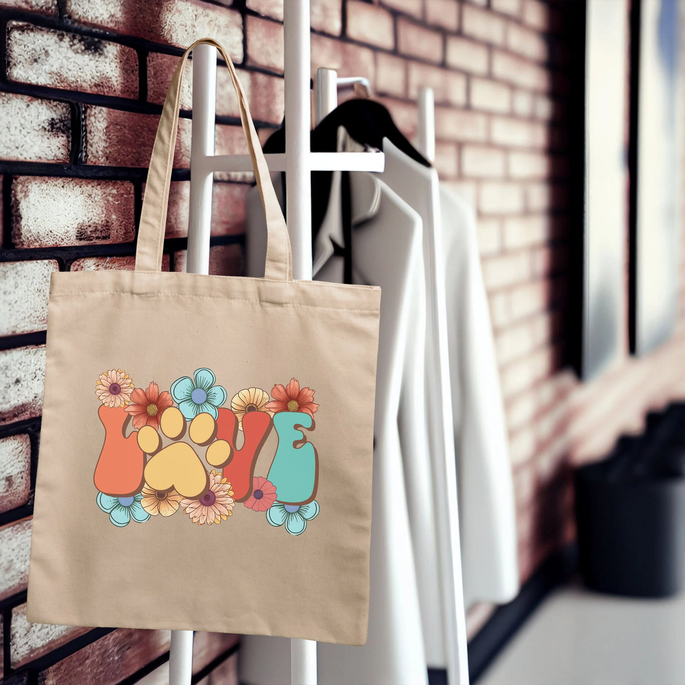 a tote bag hanging on a brick wall