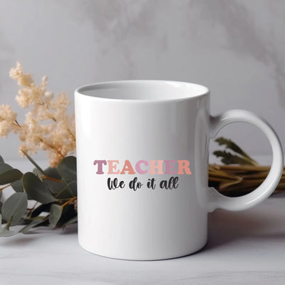 a white coffee mug with the words teacher we do it all