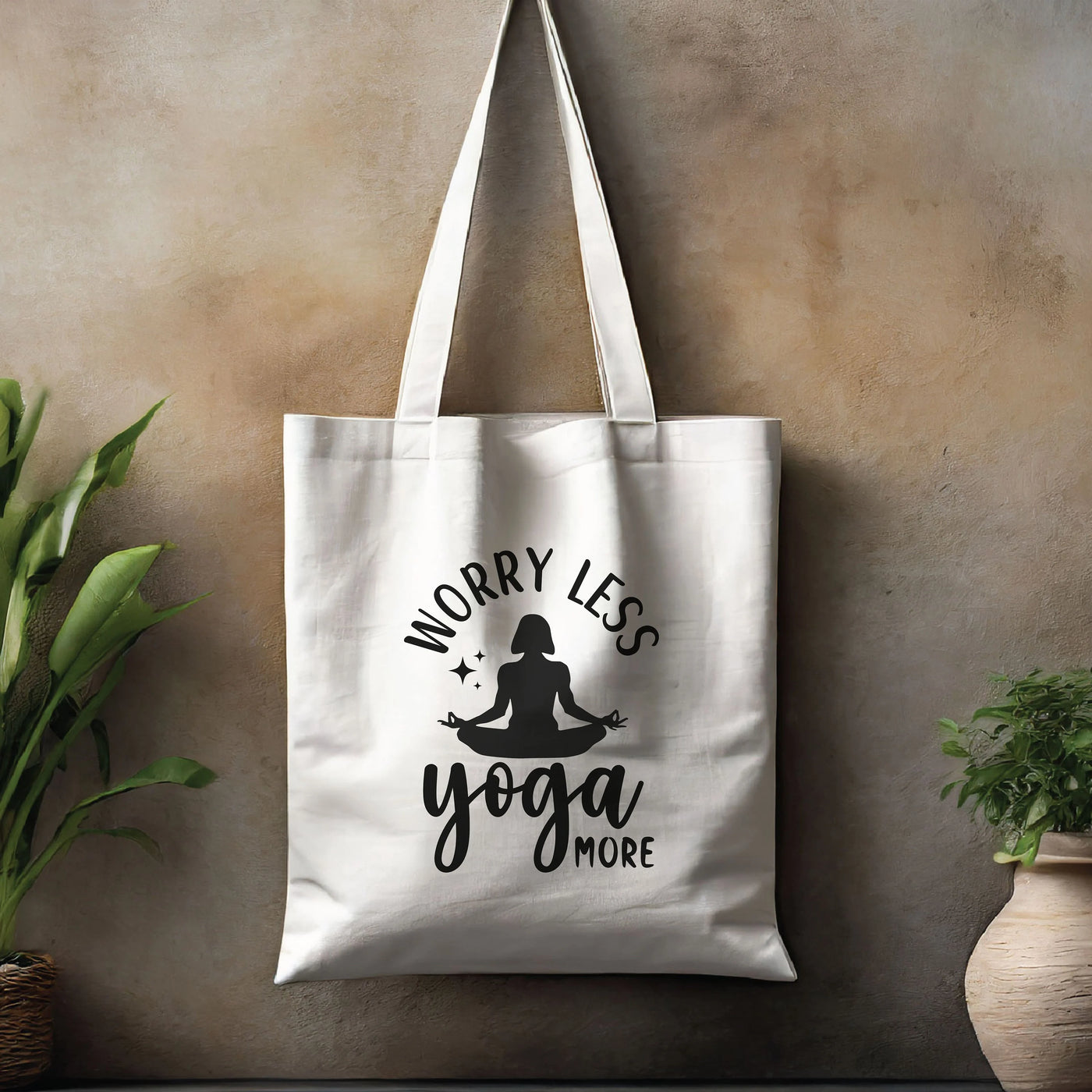 a yoga bag hanging on a wall next to a potted plant