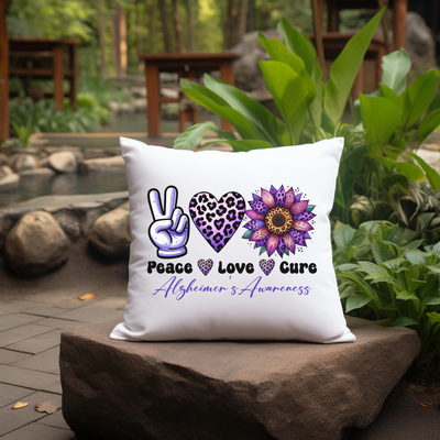 a pillow with peace, love, and a sunflower on it