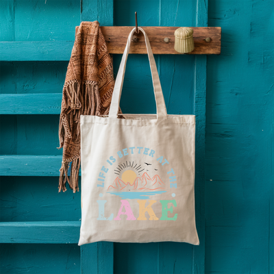 a tote bag hanging on a blue door