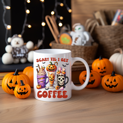 a coffee mug with a picture of three pumpkins on it