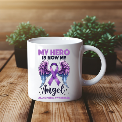 a coffee mug with an angel design on it