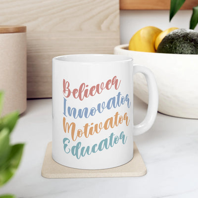 a white coffee mug sitting on top of a counter