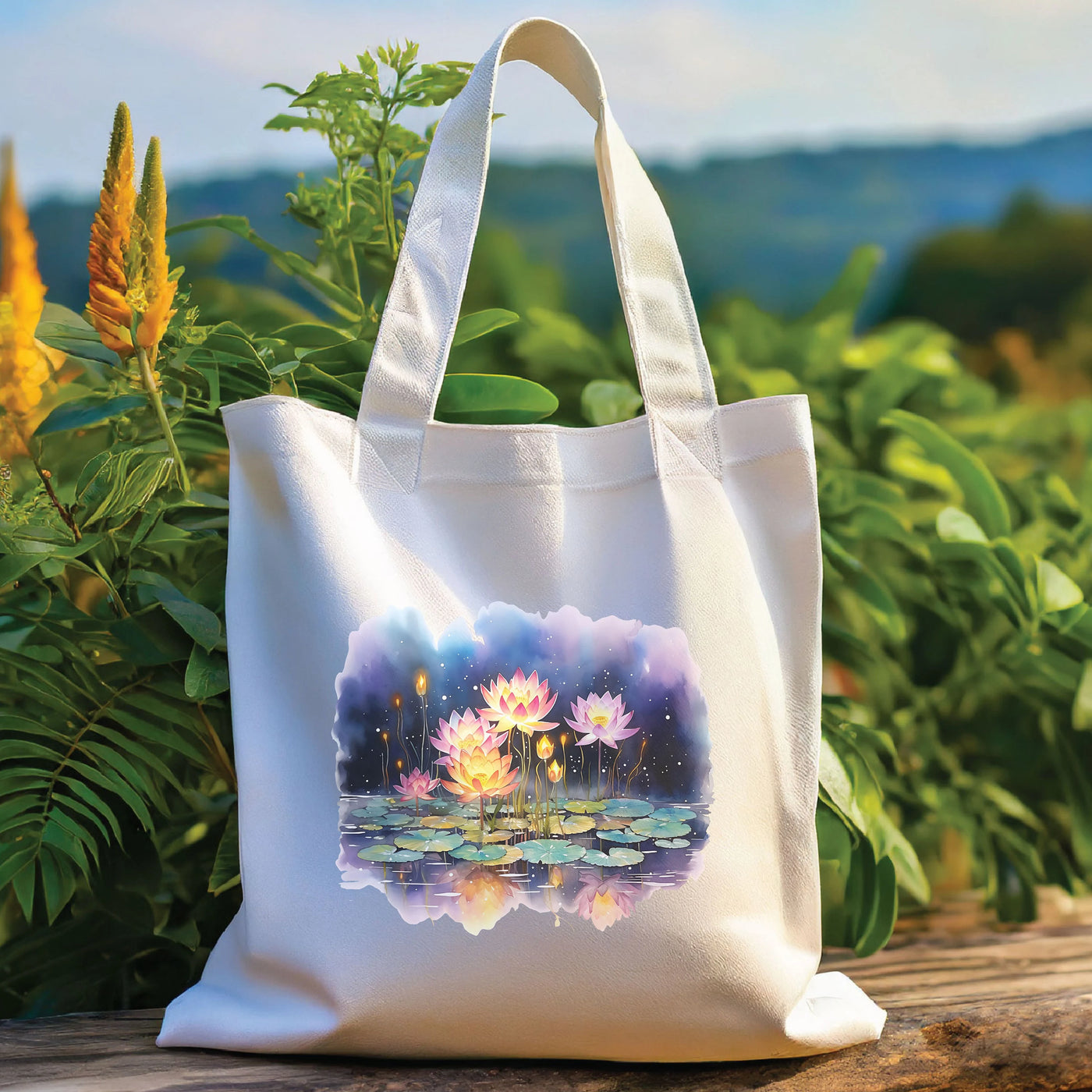 a white tote bag with a painting of water lilies