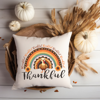 a white pillow with a thanksgiving turkey on it