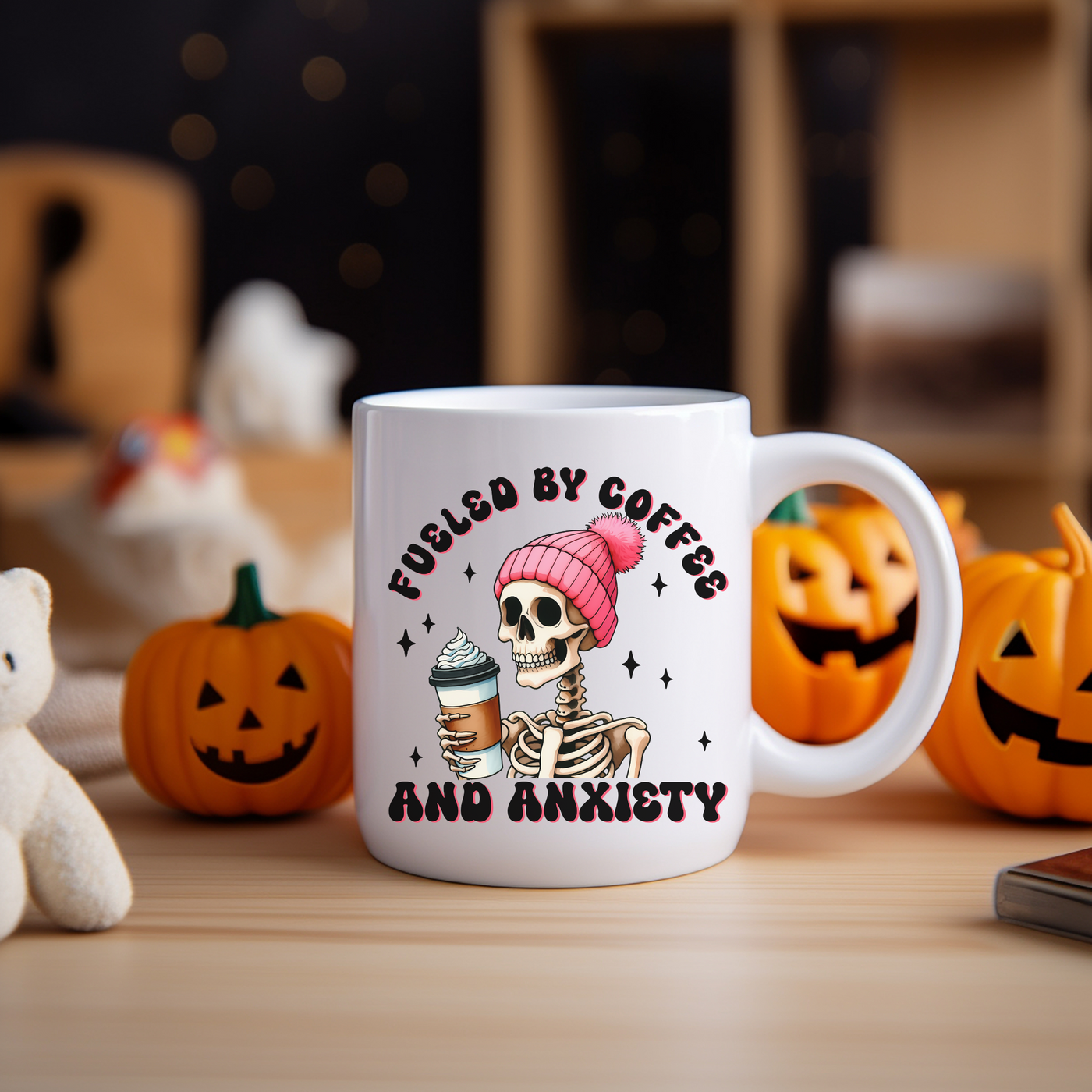 a coffee mug with a skeleton holding a cup of coffee