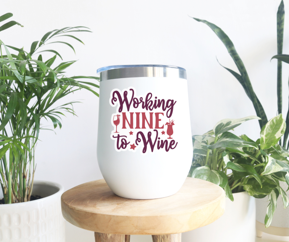 a white wine cup sitting on top of a wooden table