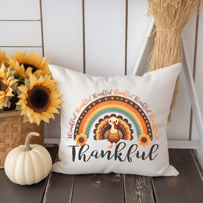 a white pillow with a thanksgiving turkey on it