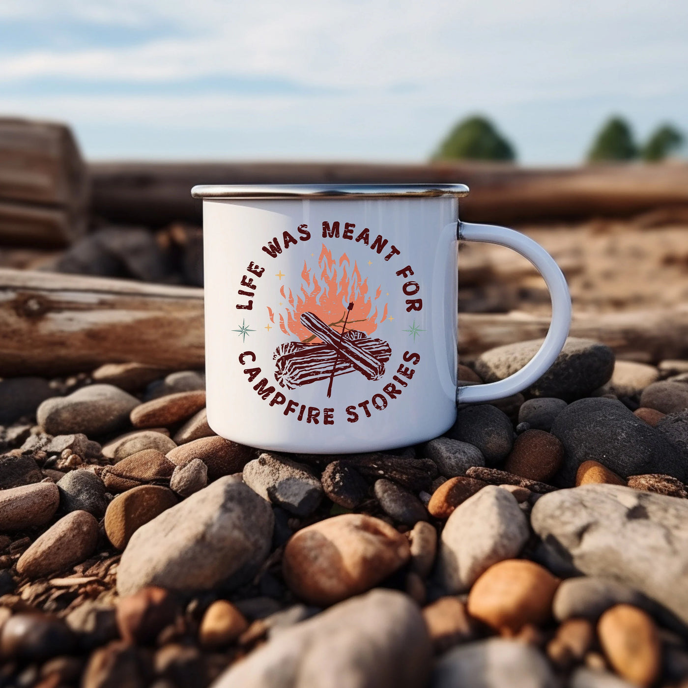 a white coffee mug sitting on top of a pile of rocks