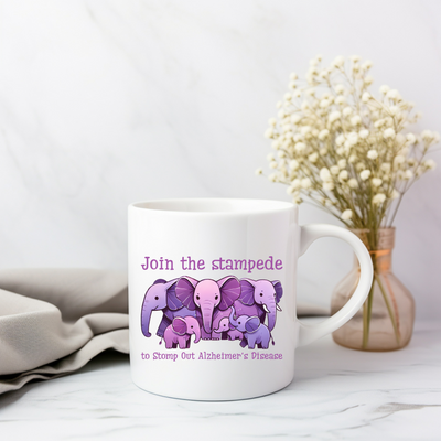 a coffee mug with a picture of three elephants on it