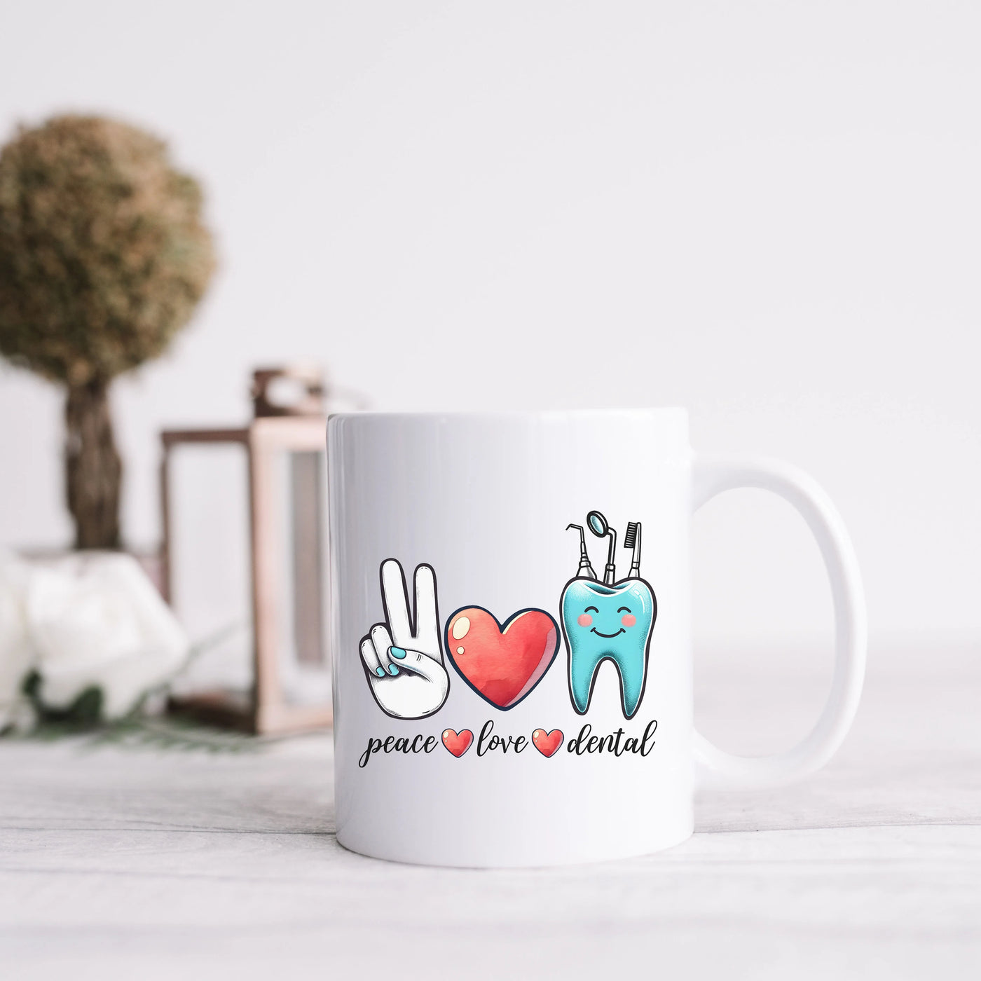 a white coffee mug with a peace love dental design