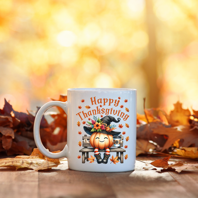 a happy thanksgiving coffee mug sitting on a table