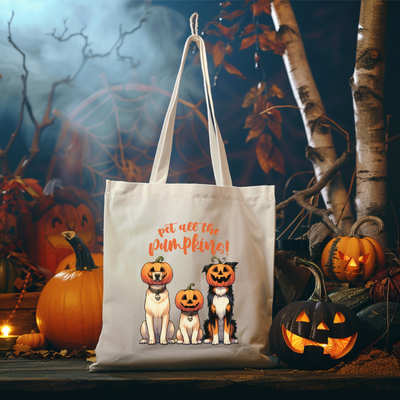 a trick or treat bag with three dogs on it