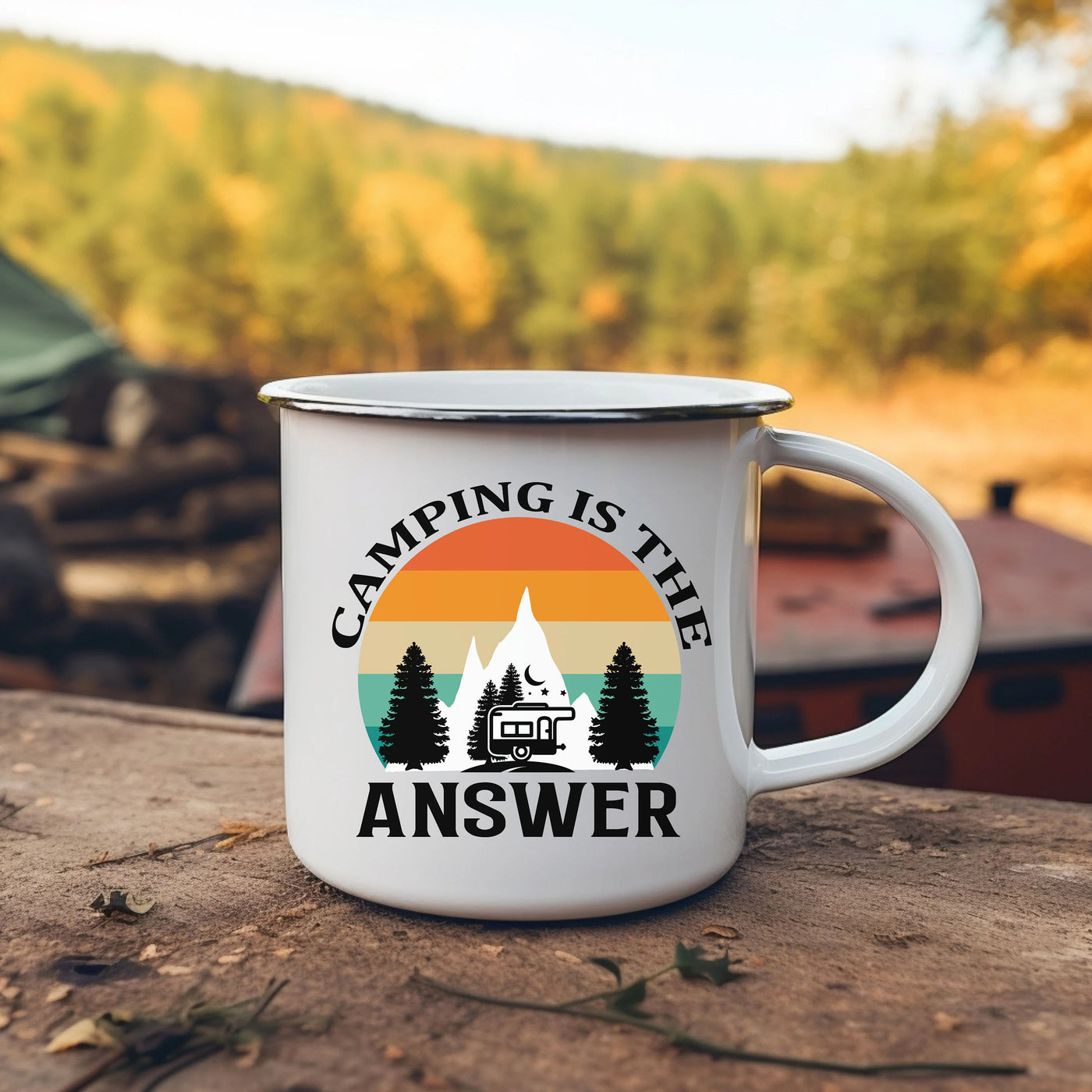 a camper mug sitting on top of a wooden table