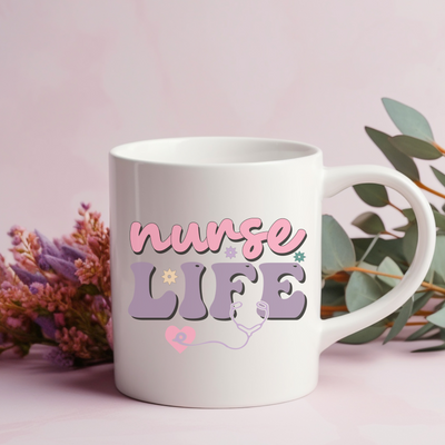 a white coffee mug with the words nurse life on it