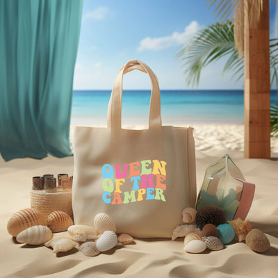 a beach scene with a tote bag and shells