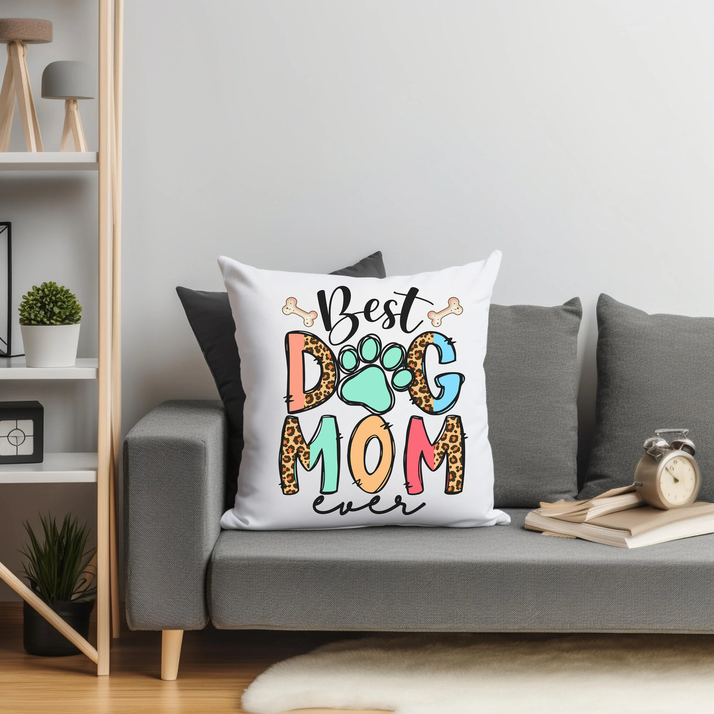 a couch with a pillow that says best dog mom ever