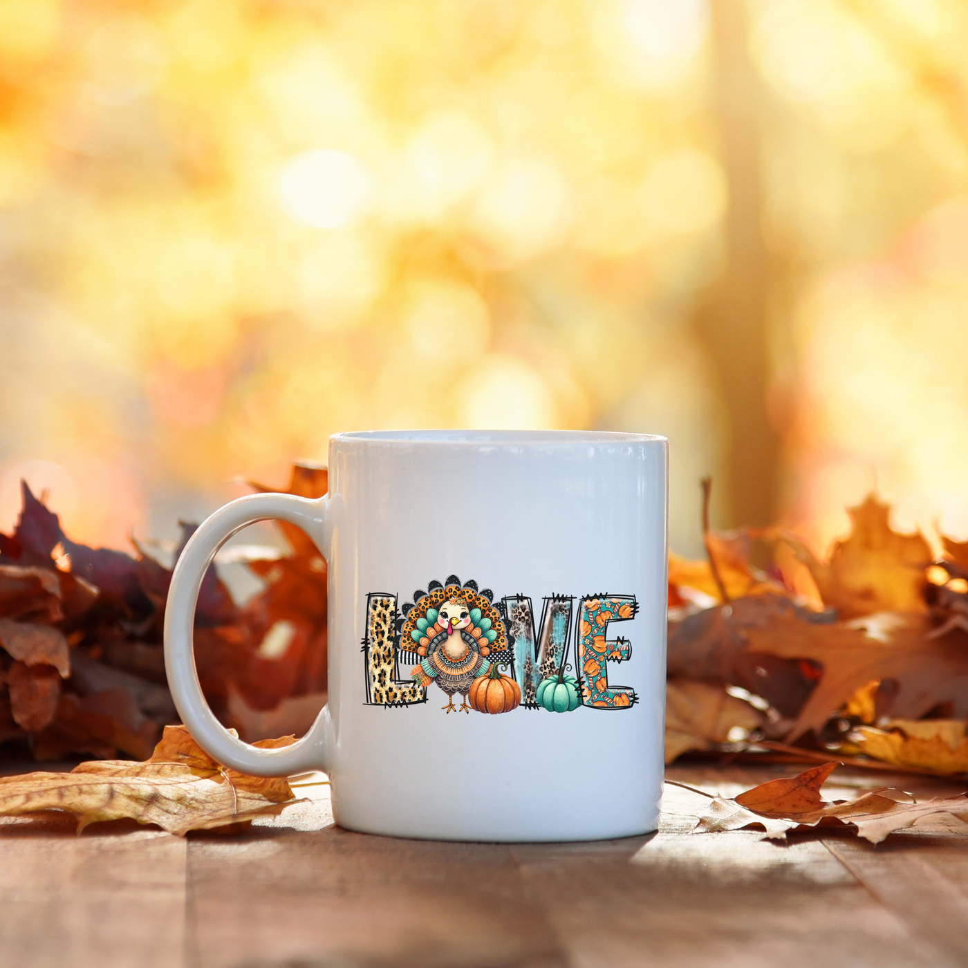 a white coffee mug sitting on top of a wooden table