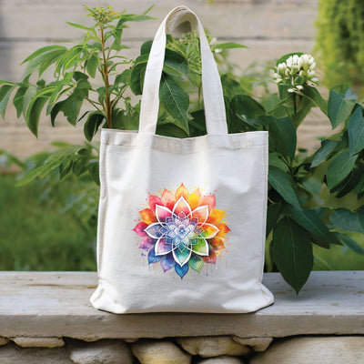 a white tote bag with a colorful flower on it