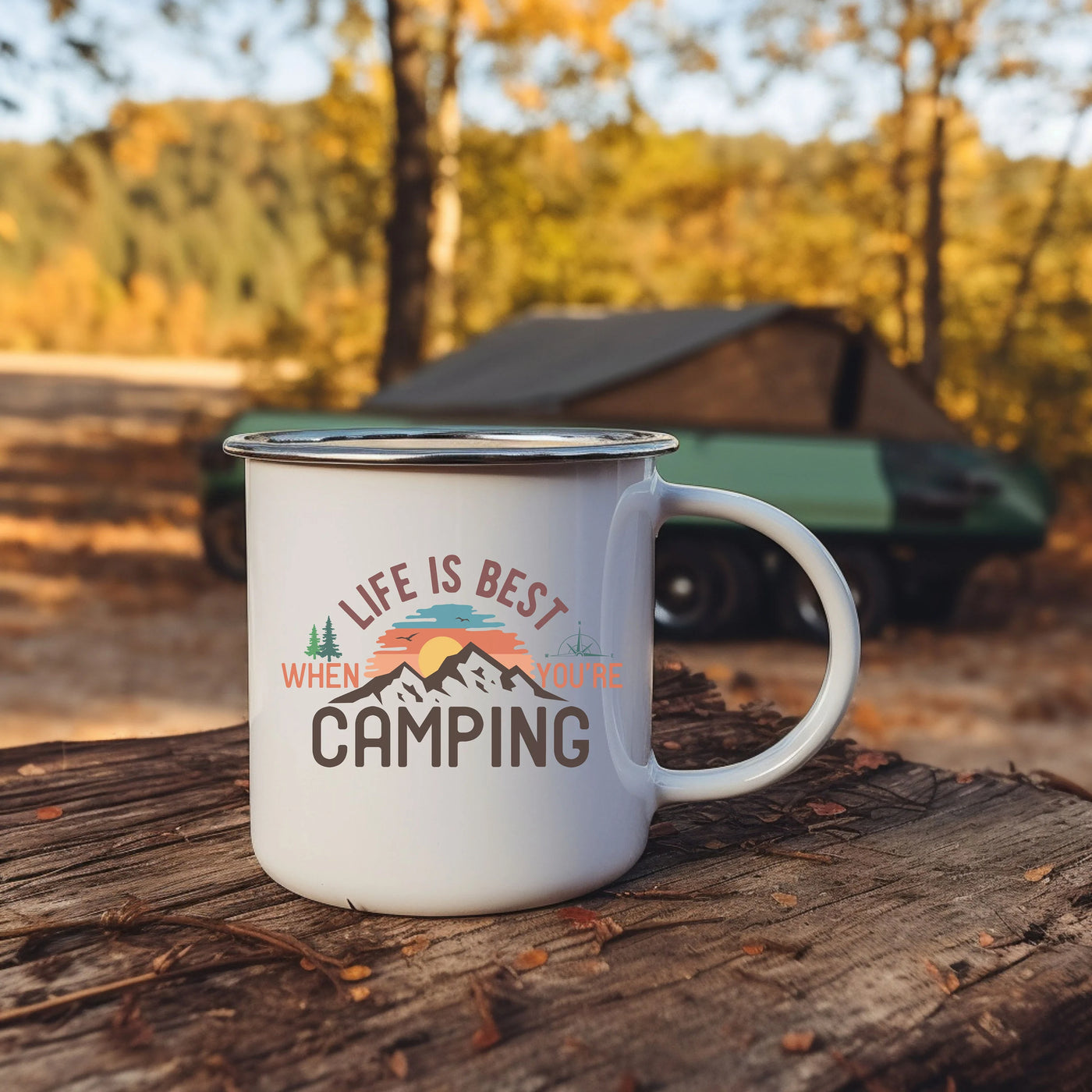 a camper mug sitting on top of a tree stump