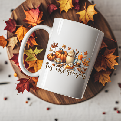 a coffee mug sitting on top of a wooden plate