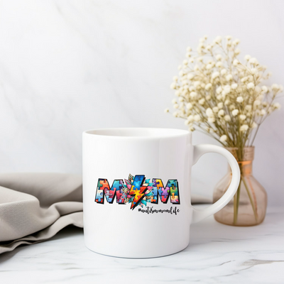 a white coffee mug with the word mom printed on it