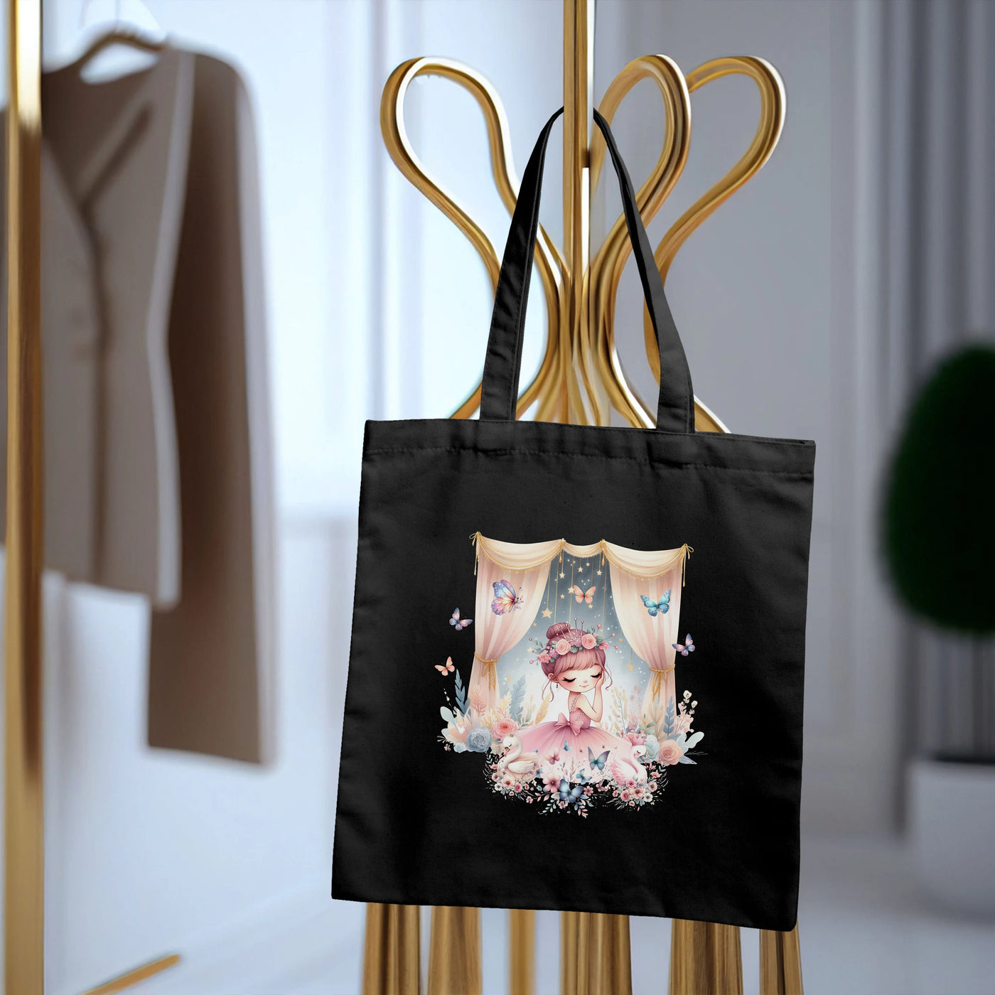 a black bag with a picture of a woman on it