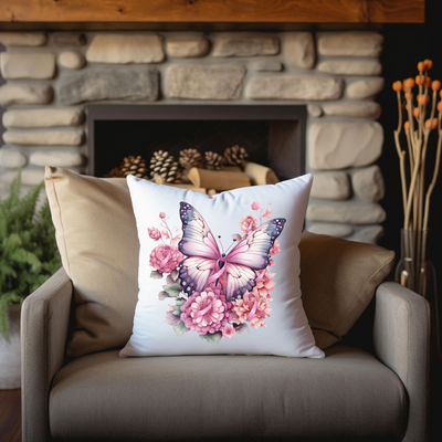 a white pillow with a pink butterfly on it