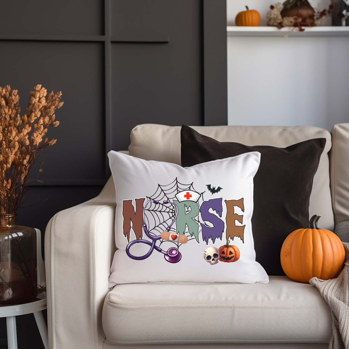 a white couch with a halloween pillow on it