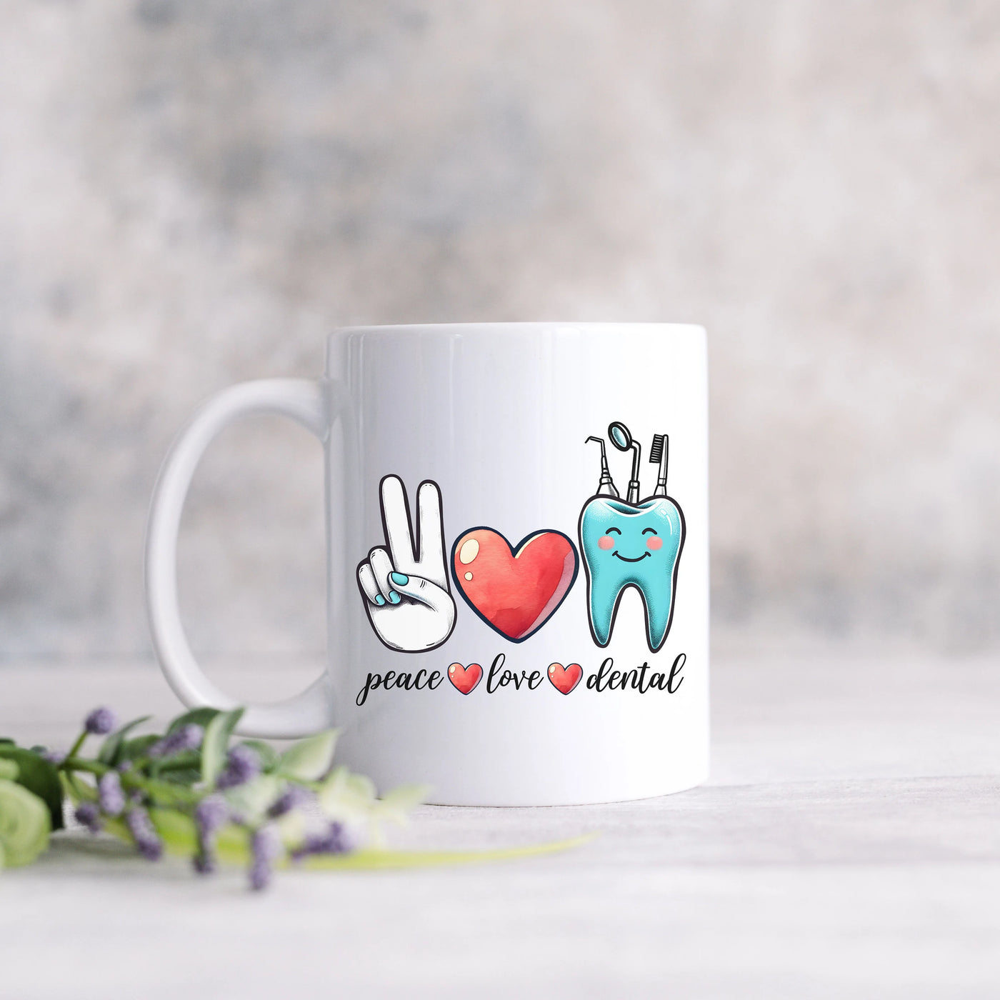 a white coffee mug with a peace love dental design on it