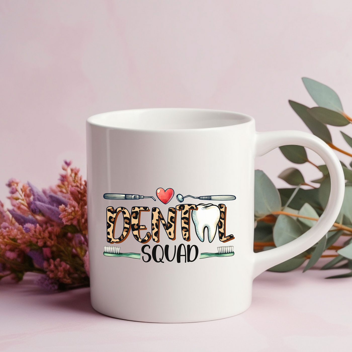 a white coffee mug with the word love on it