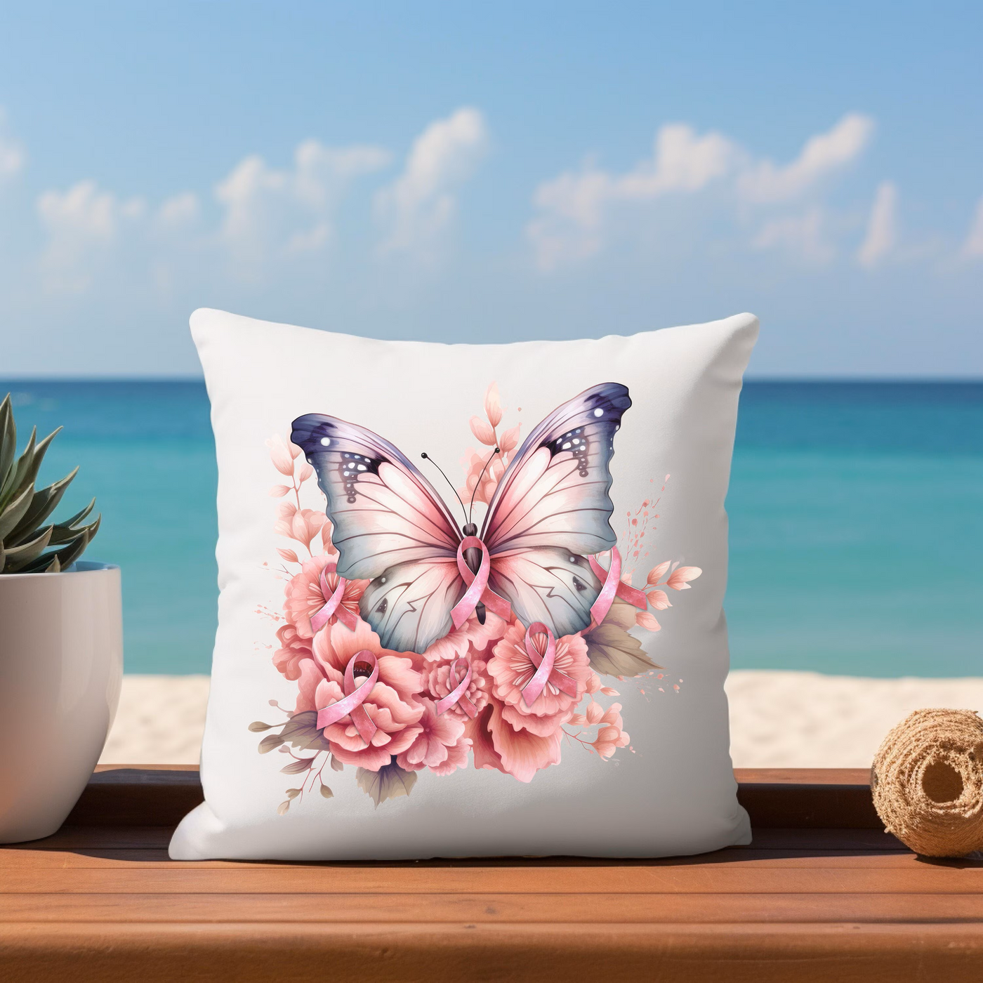 a pillow sitting on top of a wooden table next to a potted plant