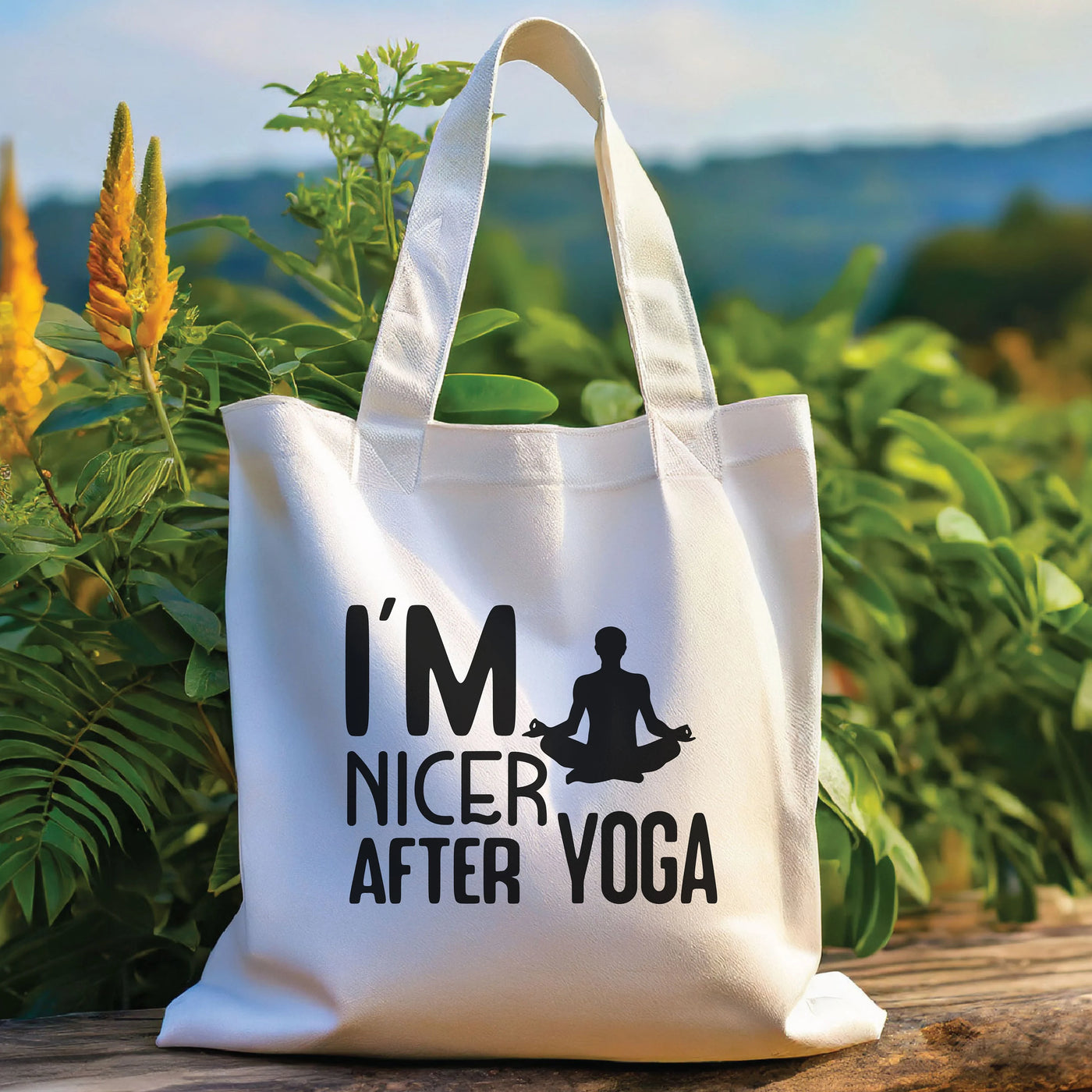 a white tote bag sitting on top of a wooden table