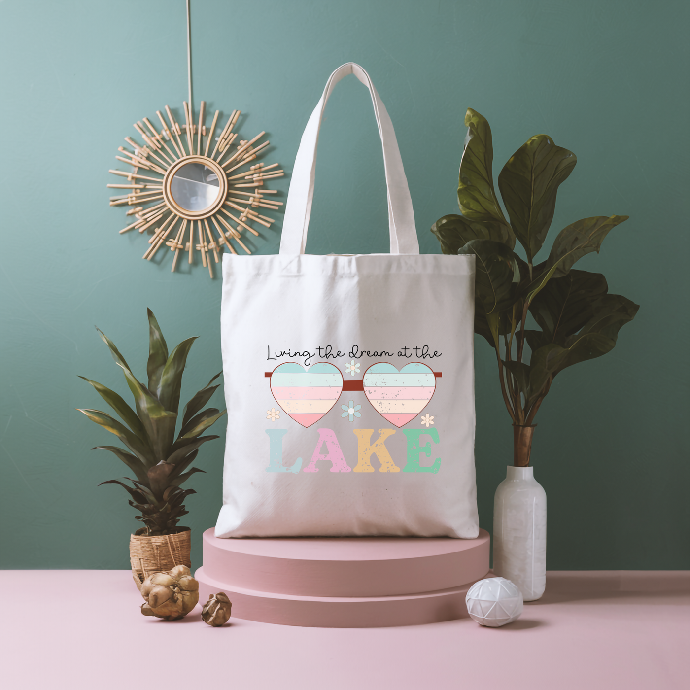 a tote bag sitting on top of a table next to a potted plant