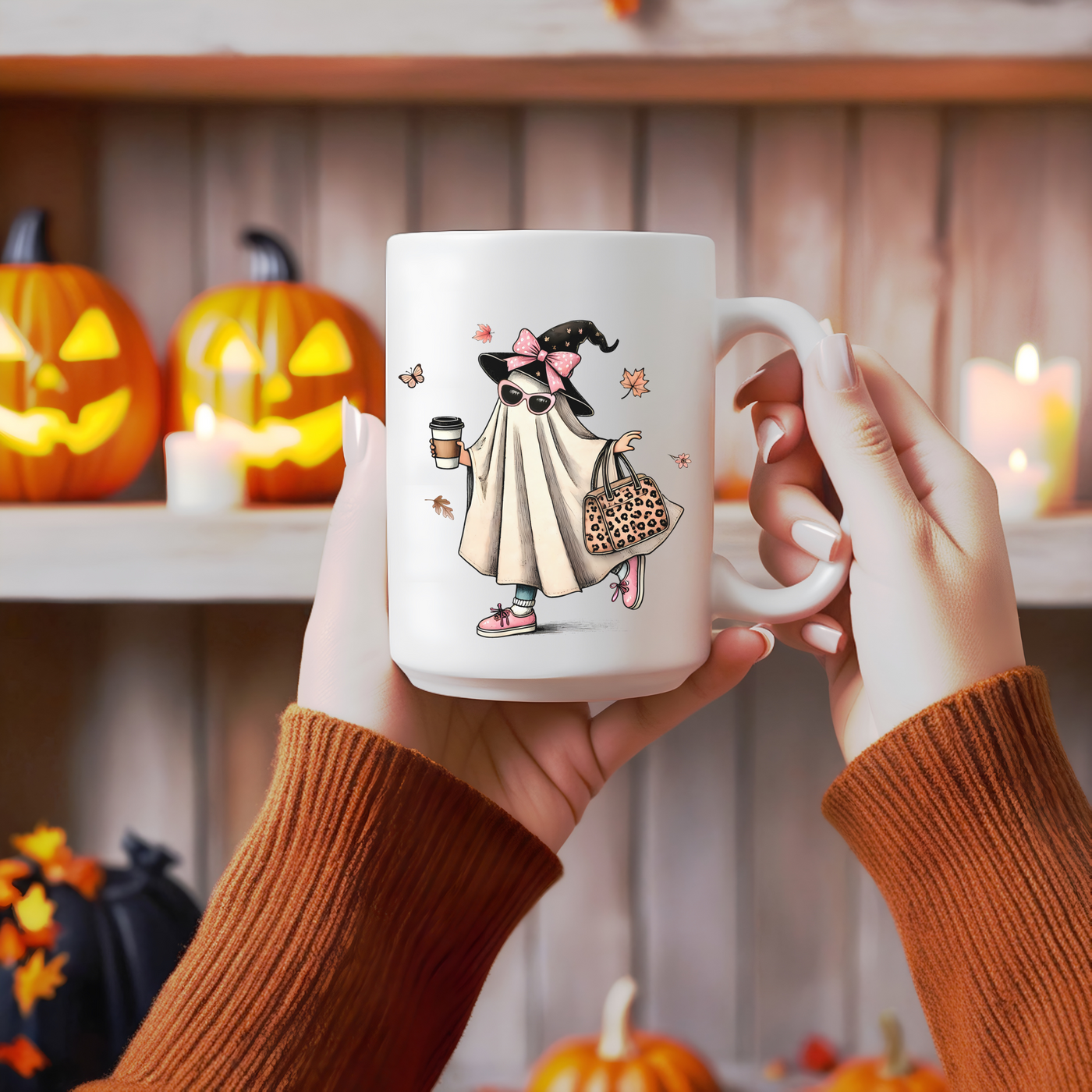 a woman holding a coffee mug with a picture of a girl on it