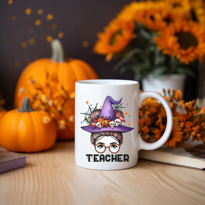 a white coffee mug with an image of a witch on it